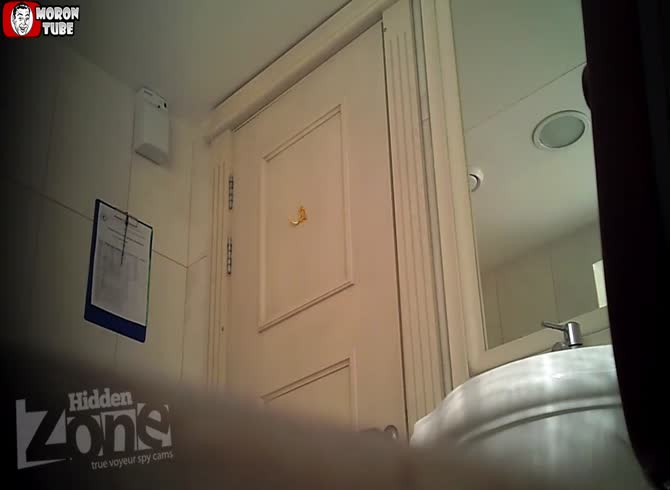 Video :A camera is left in a public restroom by a pervert
